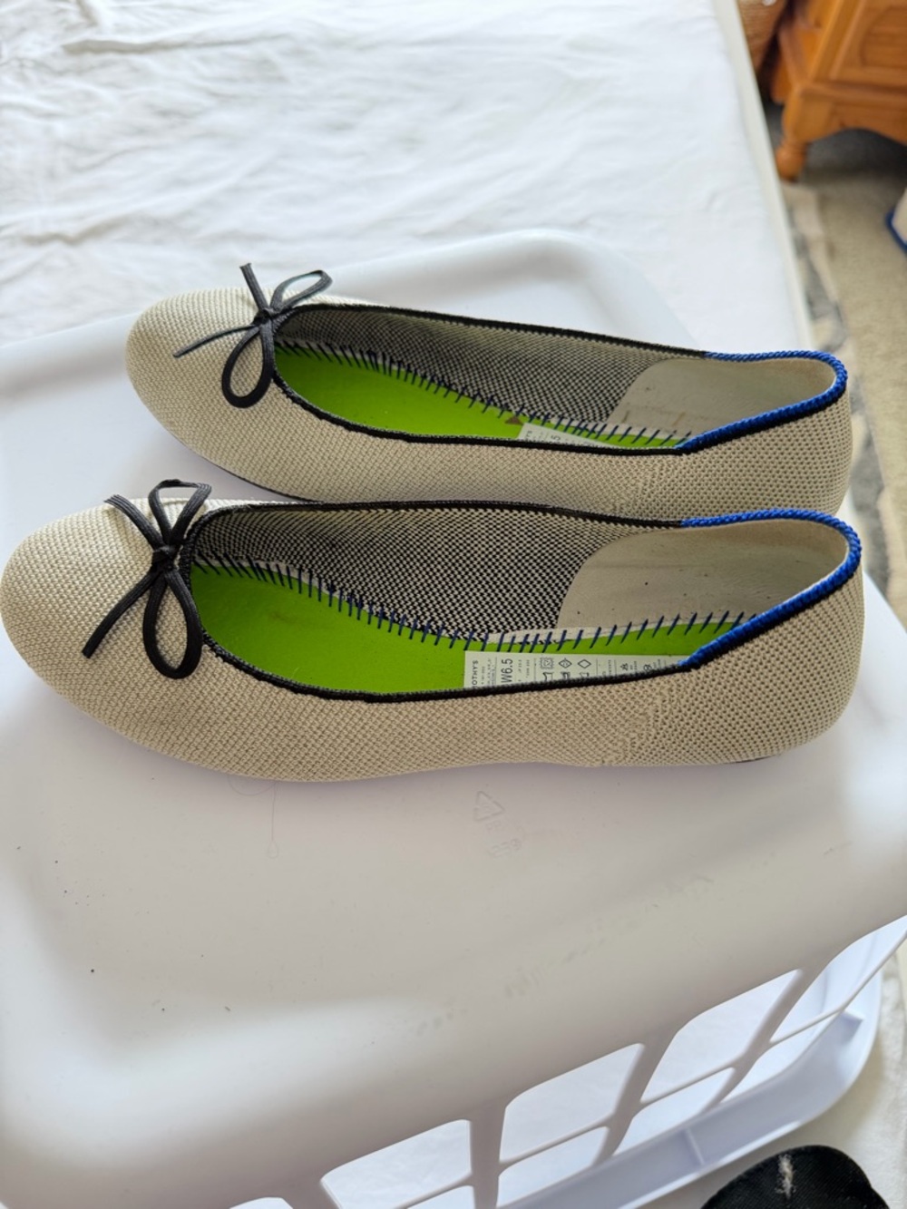 Rothy's silver Ballet Flats with Black Trim and Bow